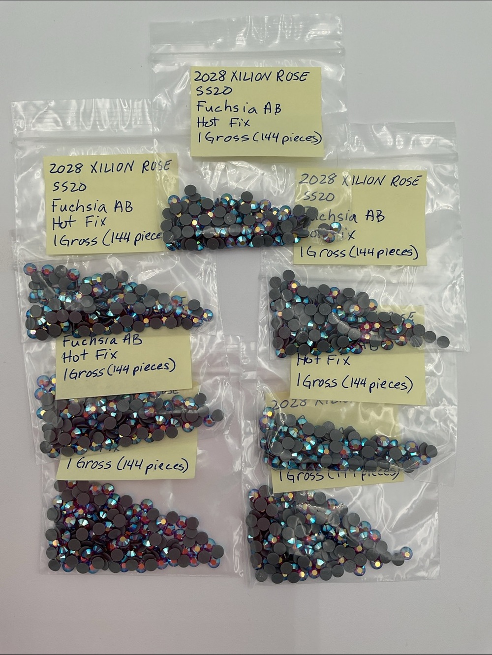 Swarovski • Color: Fuchsia Aurora Borealis, 2028 XILION Rose Hotfix Rhinestones
